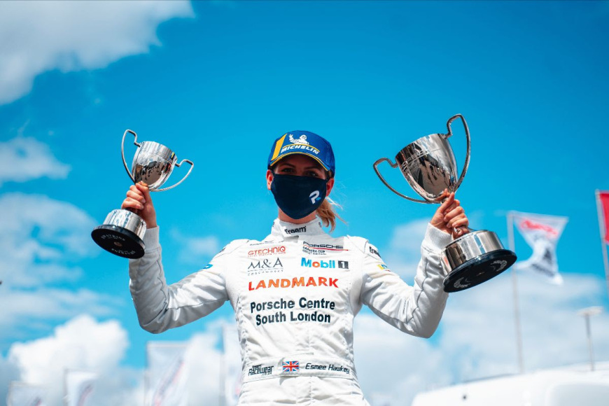 Esmee Hawkey with her Porsche winning trophies