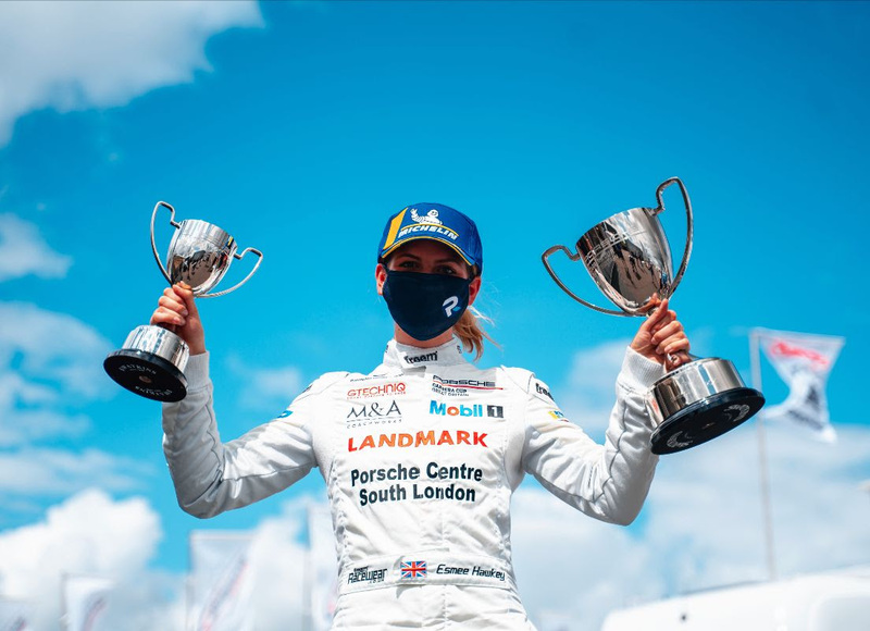 Esmee Hawkey with her Porsche winning trophies