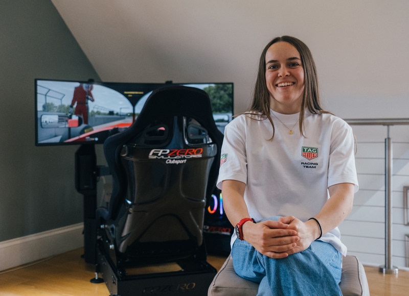 Megan Bruce, TAG Heuer F1 Academy driver, with her FPZERO Clubsport Advanced racing simulator.