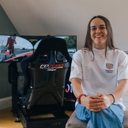 Megan Bruce, TAG Heuer F1 Academy driver, with her FPZERO Clubsport Advanced racing simulator.